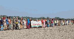 ডিমলায় ভূমিদস্যু চক্রের বিরুদ্ধে মানববন্ধন