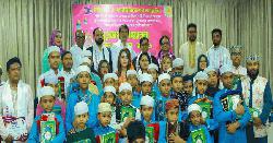 রমজান ও নারী দিবসে কোরআন শরীফ, জায়নামাজ ও সেলাই মেশিন বিতরণ